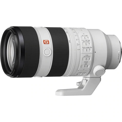 White and black lens with zoom and focus controls, designed for high-quality photography.