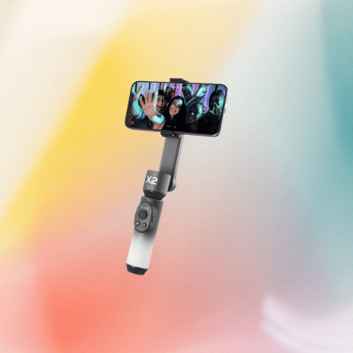 Gradient background → Zhiyun gimbal → Holding a smartphone with a group selfie.