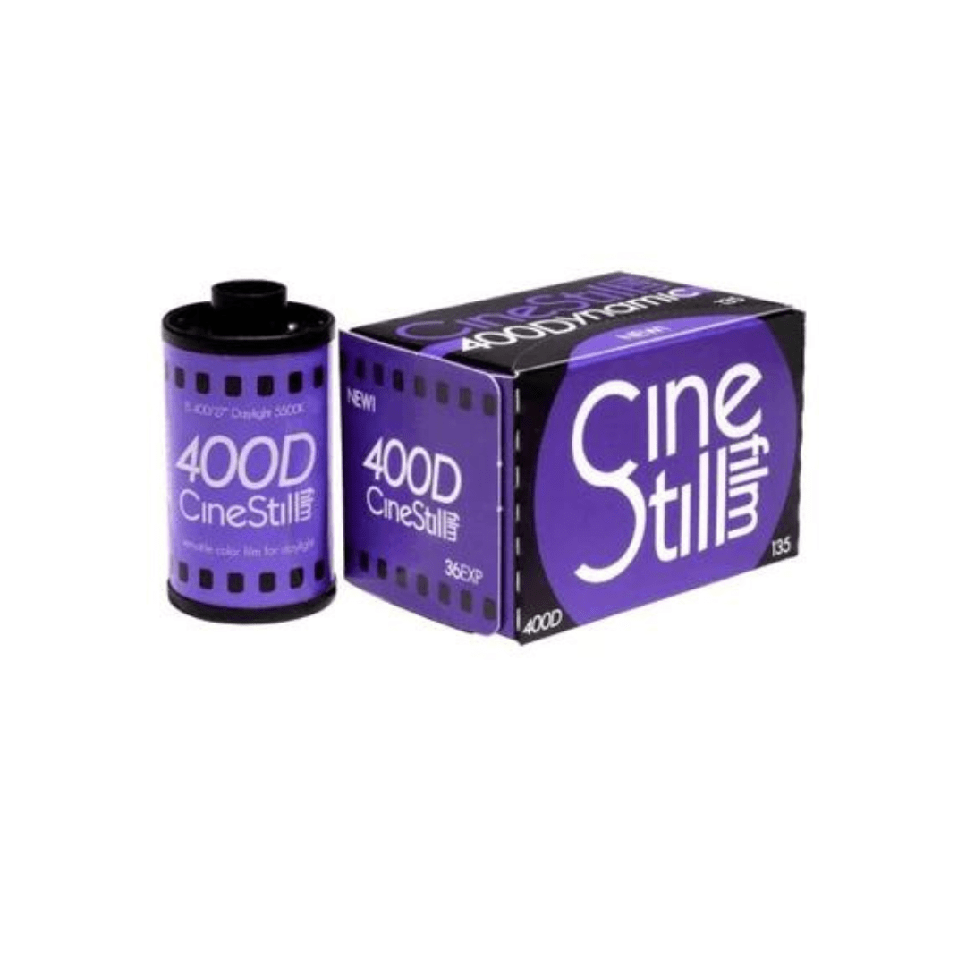 Purple CineStill 400D film canister and box, with distinct labeling and promotional text.