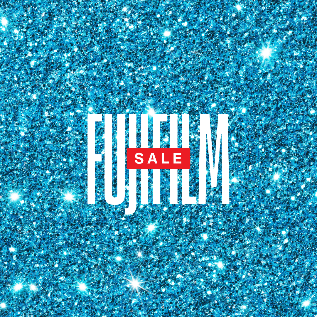 Blue glitter background with white text reading FUJIFILM and red SALE banner.