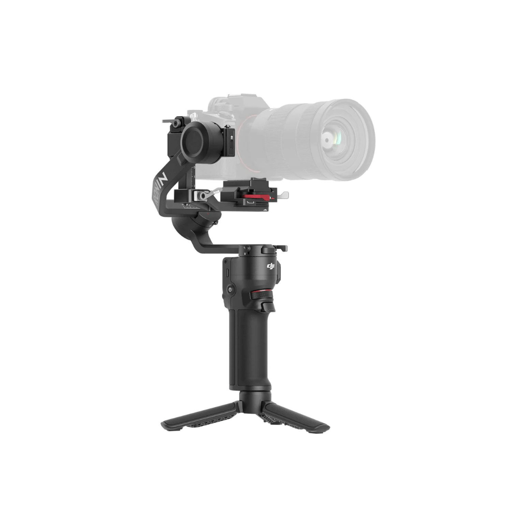 Black gimbal stabilizer with adjustable arm and tripod base.