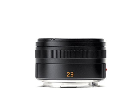 Black lens with orange detail, featuring number 23 on the front.