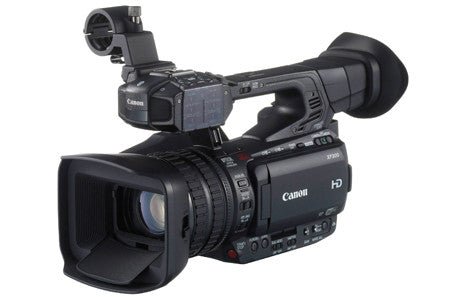 Black professional camcorder with a lens and microphone mount.